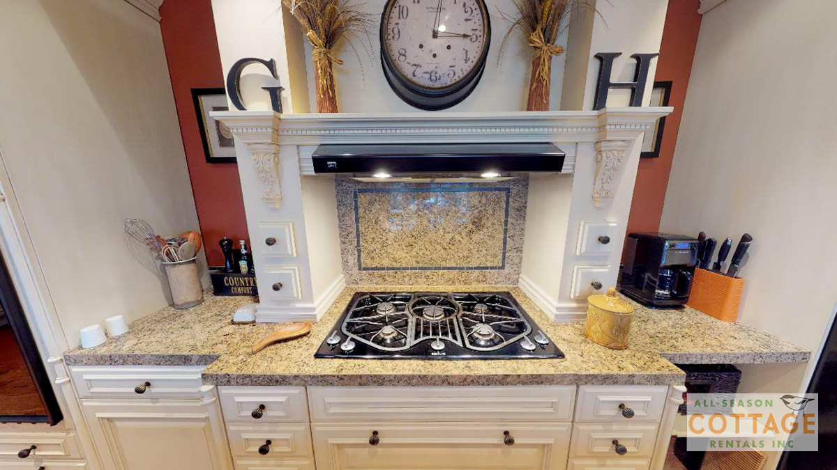Gas stove top (cottage is equipped exclusively with cast iron cookware)